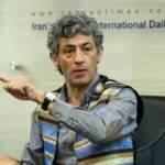 سیروس همتی در کنار همسر و دوقولوهایش